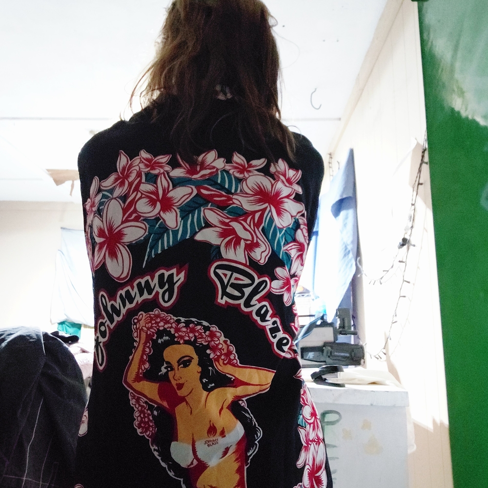 Black Graphic Shirt with Floral and Figure Design